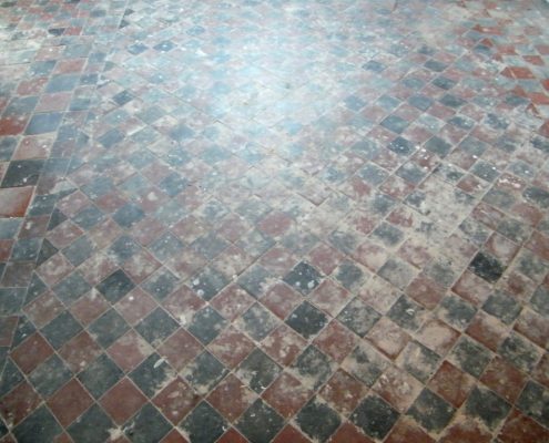 Quarry tile floor before cleaning