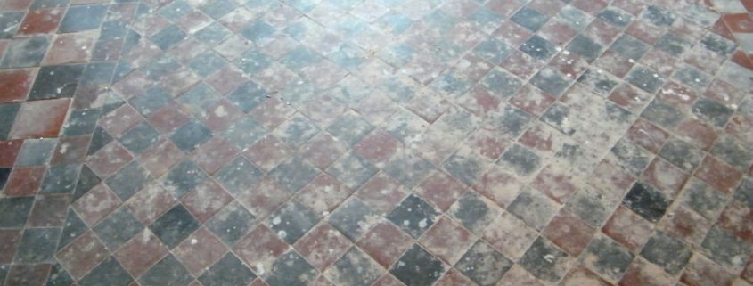 Quarry tile floor before cleaning