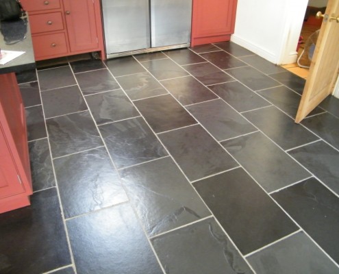 Slate floor after being stripped cleaned and sealed.