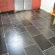 Slate floor after being stripped cleaned and sealed.