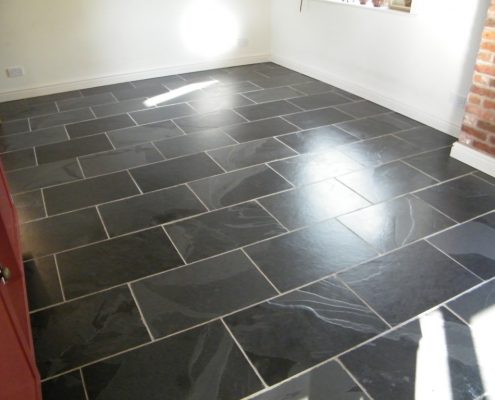 Slate floor stripped cleaned sealed.