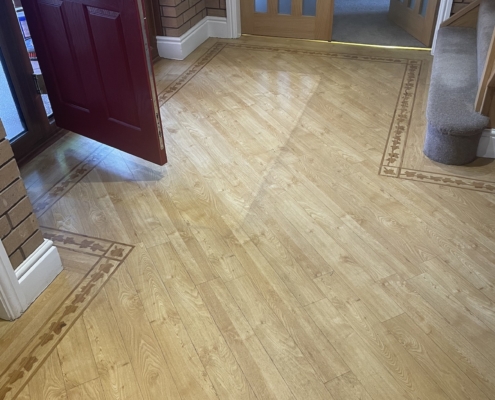 Amtico floor before cleaning, stripping and dressing in Northop Hall, North Wales