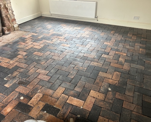 Brick floor deep cleaned, stripped and colour enhanced sealed in Sandbach, Cheshire after