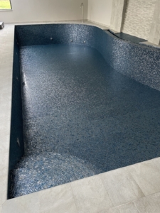 Glass Mosaic to internal pool and textured porcelain to pool surround cleaning and sealing - after 3
