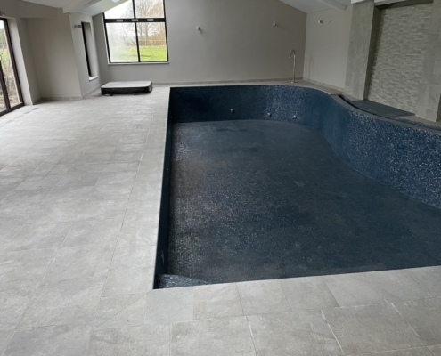 Glass Mosaic to internal pool and textured porcelain to pool surround cleaning and sealing - before