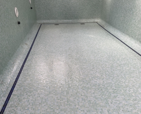 Mosaic tiled swimming pool in cleaning Knutsford, Cheshire - before