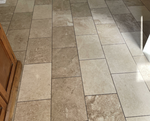 Polished Limestone floor before cleaning, honing, sealing and Polishing in Lymm Cheshire