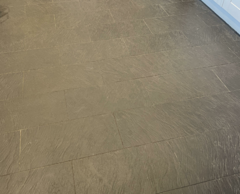 Porcelain kitchen floor before cleaning in Uttoxeter, Staffordshire