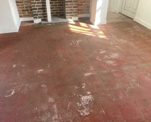 Quarry tiled floor before cleaning in Standon, Staffordshire