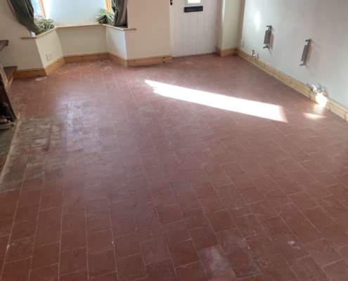Quarry tiles before cleaning and sealing in Utkinton, near Tarporley, Cheshire