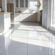 Shiny ceramic tile floor in a modern home with natural light reflecting, highlighting cleanliness and durability.