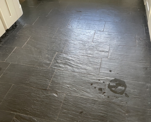 Slate floor before cleaning and sealing in Longnor near Leek, Staffordshire