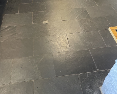 Slate floor before cleaning and sealing in Ormskirk, Lancashire 1