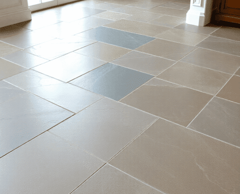 Slate floor with natural color variations and subtle sheen, highlighting textured layered mineral patterns in a bright, inviting interior.