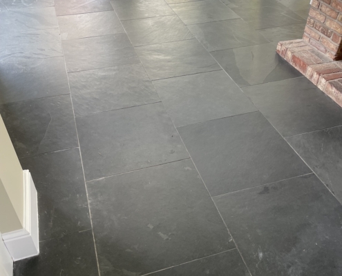 Slate floors before cleaning and sealing in Wybunbury, Nantwich, Cheshire 1