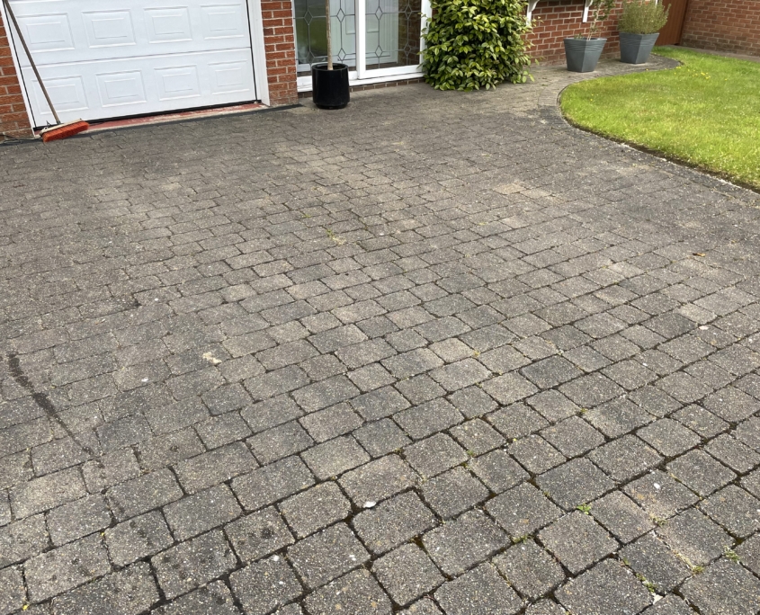 Stone block driveway jet washing in Holmes Chapel, Cheshire Tile