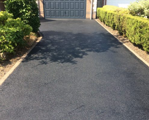 Tarmac renovation on driveway in Macclesfield, Cheshire after