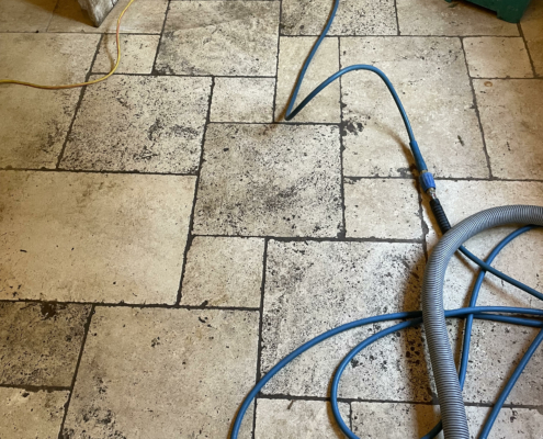 Travertine before cleaning honing and sealing in Newcastle under Lyme, Staffordshire