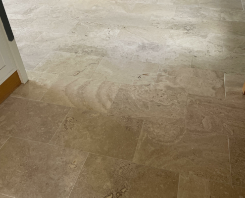 Travertine floor after cleaning, hole filling, honing and sealing in Audlem, Cheshire