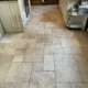 Travertine floor after cleaning, honing and sealing In Newcastle under Lyme, Staffordshire