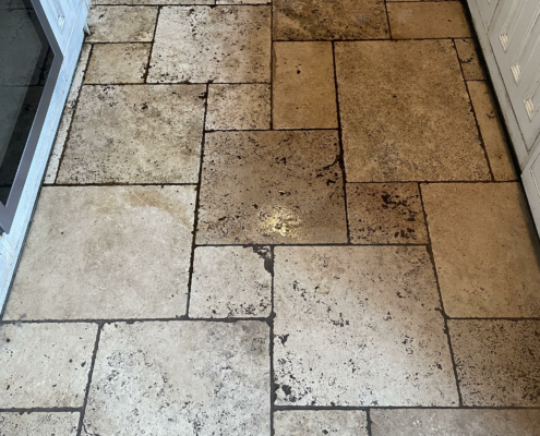 Travertine floor before cleaning, honing and sealing In Newcastle under Lyme, Staffordshire
