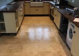Travertine floor in Alderley Edge, Cheshire after cleaning, filling sealing and polishing