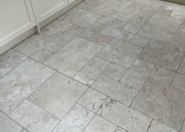 Travertine kitchen floor after cleaning and sealing in Macclesfield, Cheshire