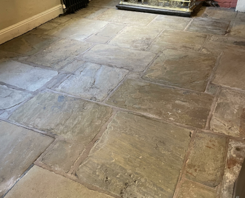 Yorkstone Bar floor after cleaning and sealing in The Swan Hotel, Tarporley, Cheshire