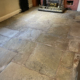 Yorkstone Bar floor after cleaning and sealing in The Swan Hotel, Tarporley, Cheshire