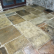 Yorkstone floor after cleaning and sealing using colour enhancer in Thornhill, Hope Valley, Derbyshire