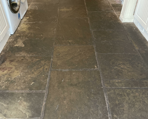 Yorkstone floor before cleaning and sealing in Southport