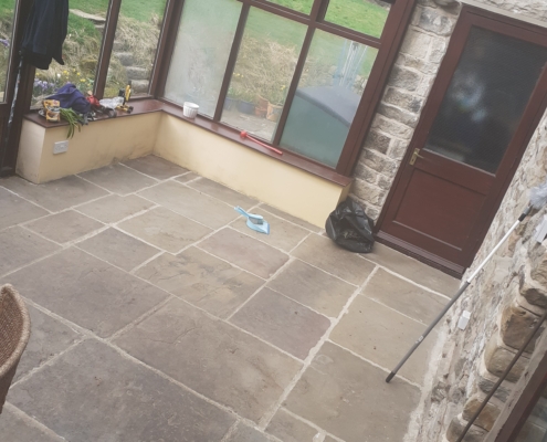 Yorkstone floor before cleaning in Thornhill Hope Valley Derbyshire